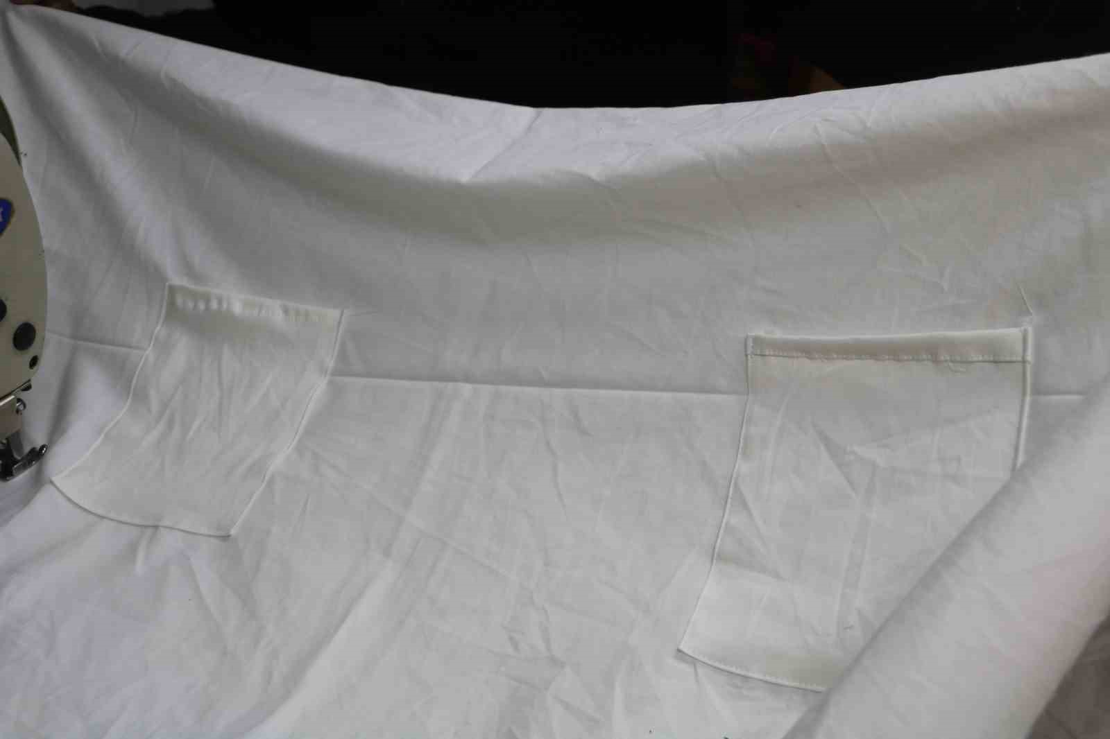 İş yerinin camına astığı "Kefene cep dikilir" yazısıyla ilgi odağı olan esnaf, yazıyı cimrilerin inadına kaldırmıyor
