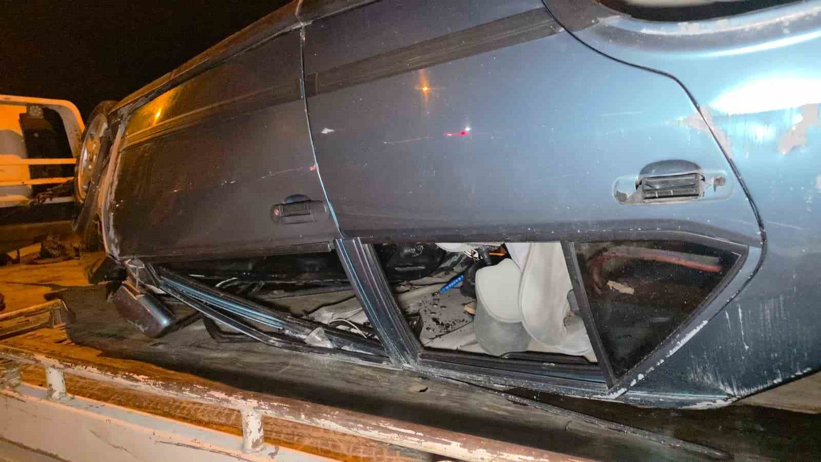 Takla atan otomobilden burunları bile kanamadan çıktılar
