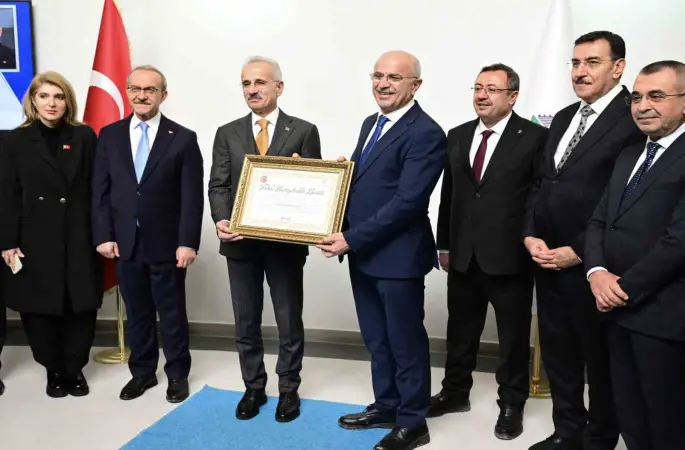 Başkan Er’den Bakan Uraloğlu’na "Fahri Hemşehrilik Beratı"
