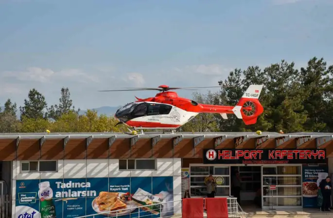 Baygın haldeki genç kızın yardımına ambulans helikopter yetişti
