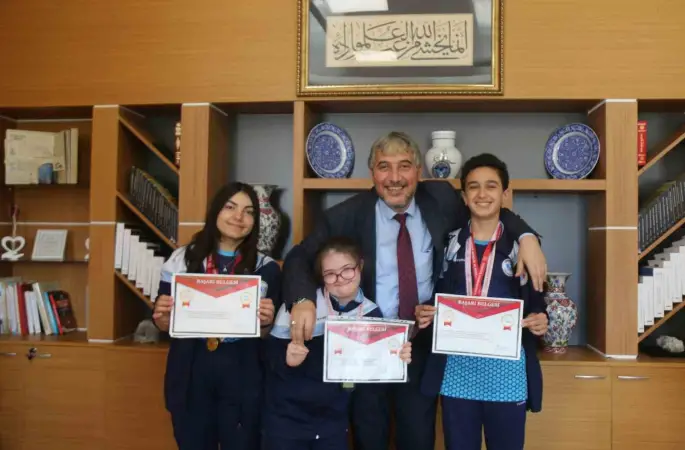 Müdür Yılmaz, şampiyon sporcuları tebrik etti
